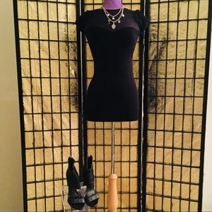 Poof! Black mini dress